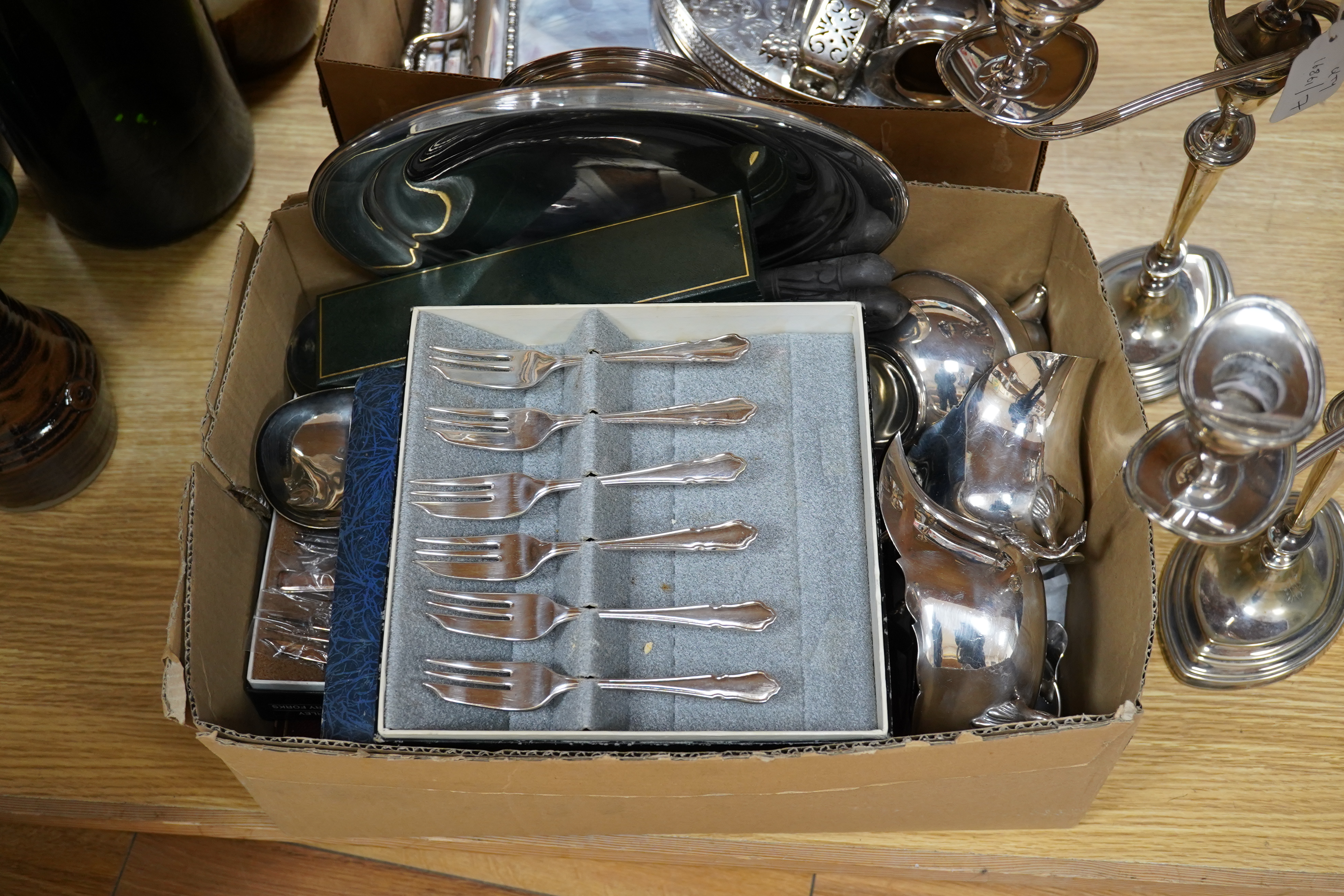 A quantity of assorted plated ware including a pair of three light candelabra - 39cm high. Condition - all fair to good